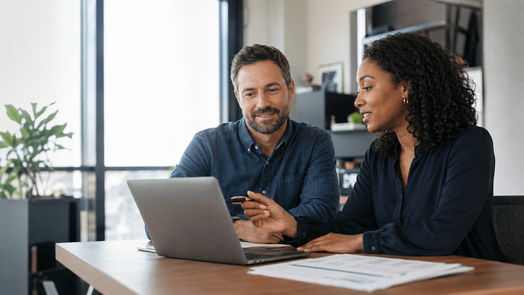 Business owner reviewing funding details with a Capital Firm advisor